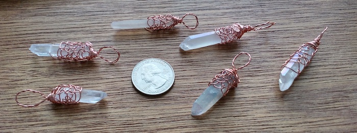 Jewelry: wire trees on agate bases, with glass bead leaves, inside tiny corked bottles